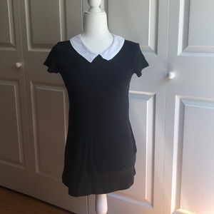 Black dress with Peterson collar.